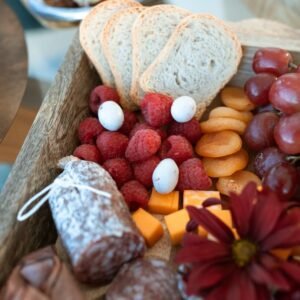 Red and Brown Round Fruits on Brown Wooden Tray